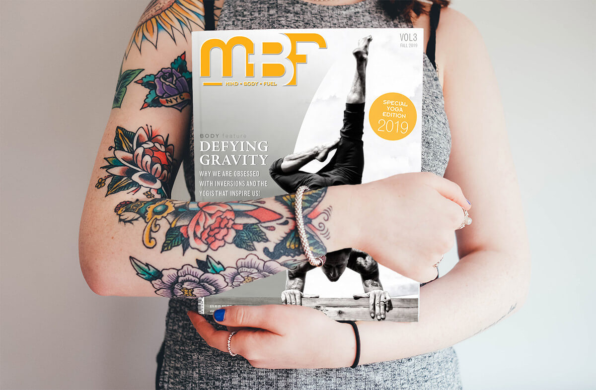 lady holding MBF magazine